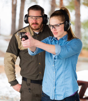 Waco gun training classes woman shooting gun at range learn to shoot combo class