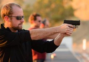 man enjoys gun class at central texas range